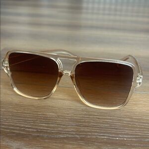 Stylish Transparent Sunglasses with Brown Lenses